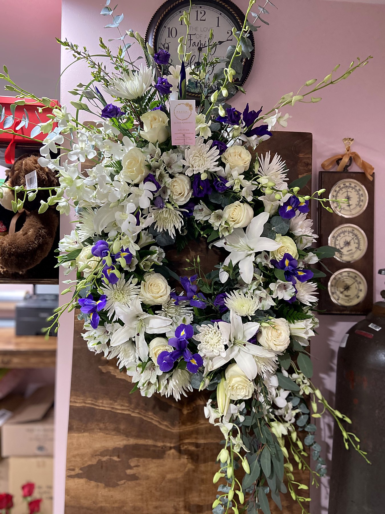 Standing spray of white and purple iris